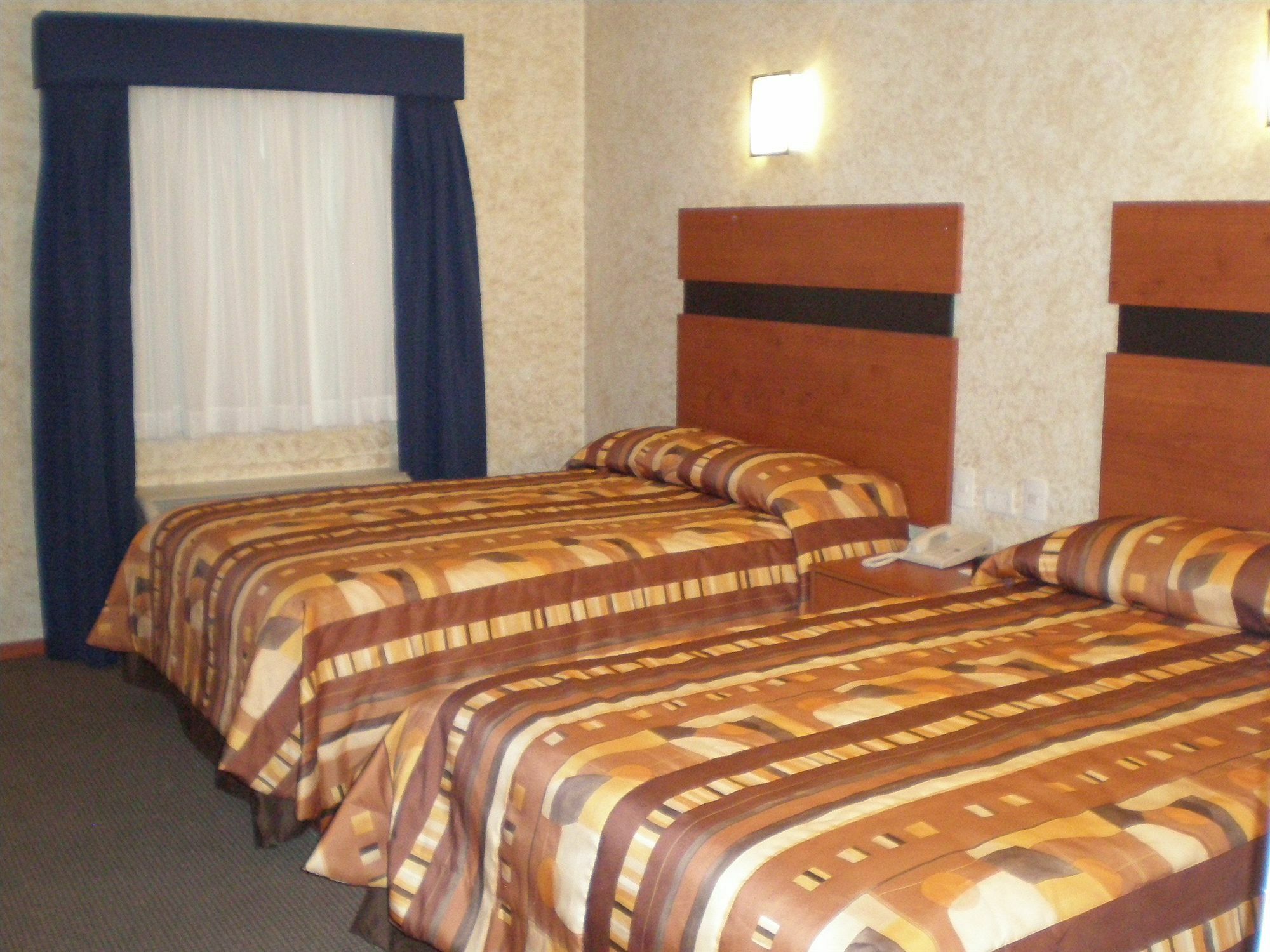 American Inn Hotel & Suites Delicias Extérieur photo